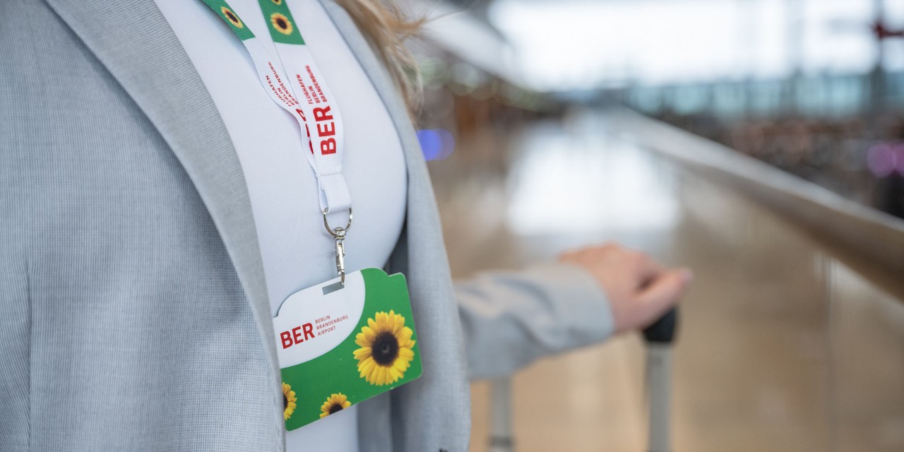 Person with Sunflower badge