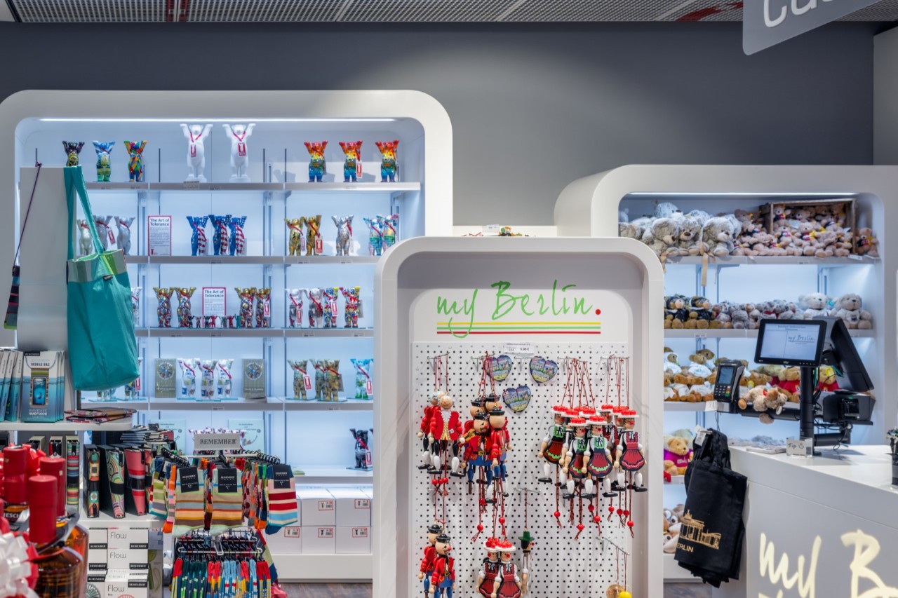 Close-up of what's on offer in the my Berlin store. Toy figures and stuffed animals on the shelves.