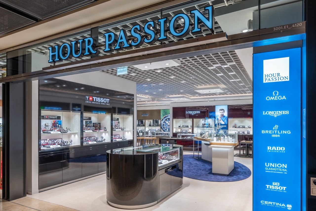 View of the Hour Passion store from outside. Watches on display.