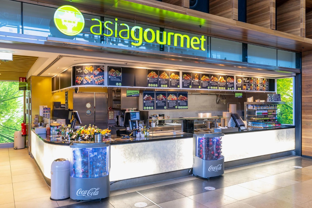 View of the sales counter with food and drinks from outside.