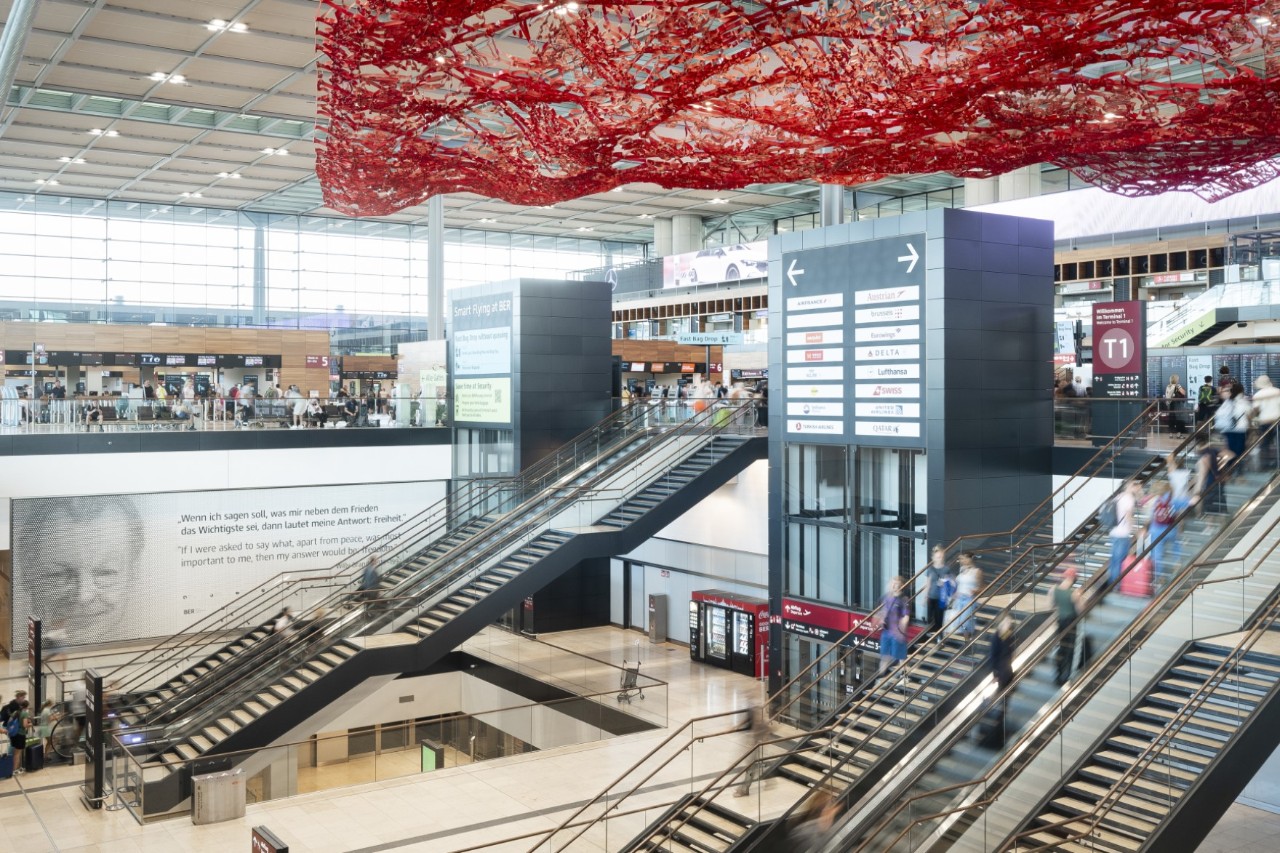 Check-in hall with the Magic Carpet artwork