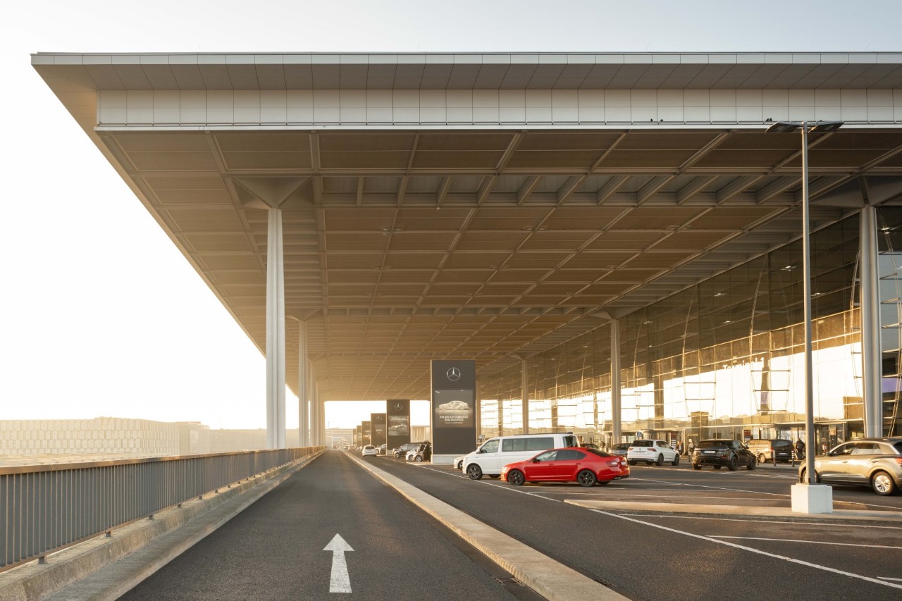 View of Terminal 1 with a short-term parking lot.