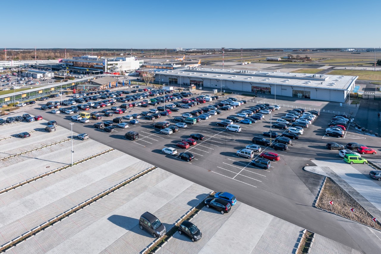 Many cars in a car park.