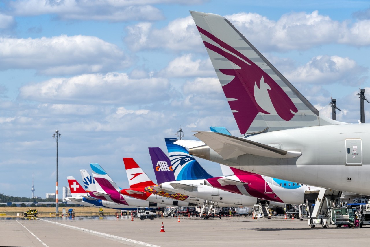 Numerous aircraft tails on apron A, including those belonging to Qatar, Austrian and Eurowings