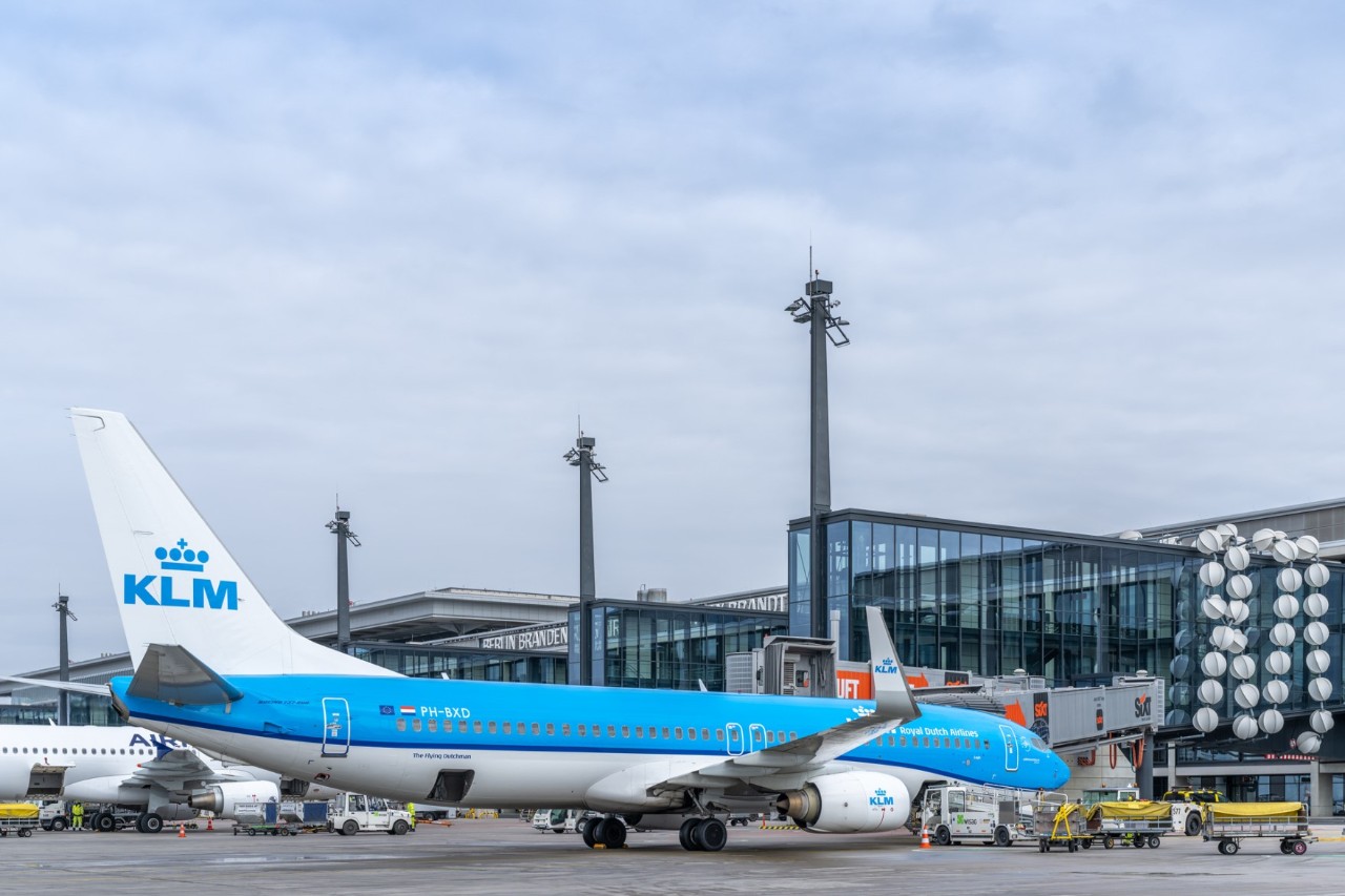 blue KLM plane in front of Terminal 1