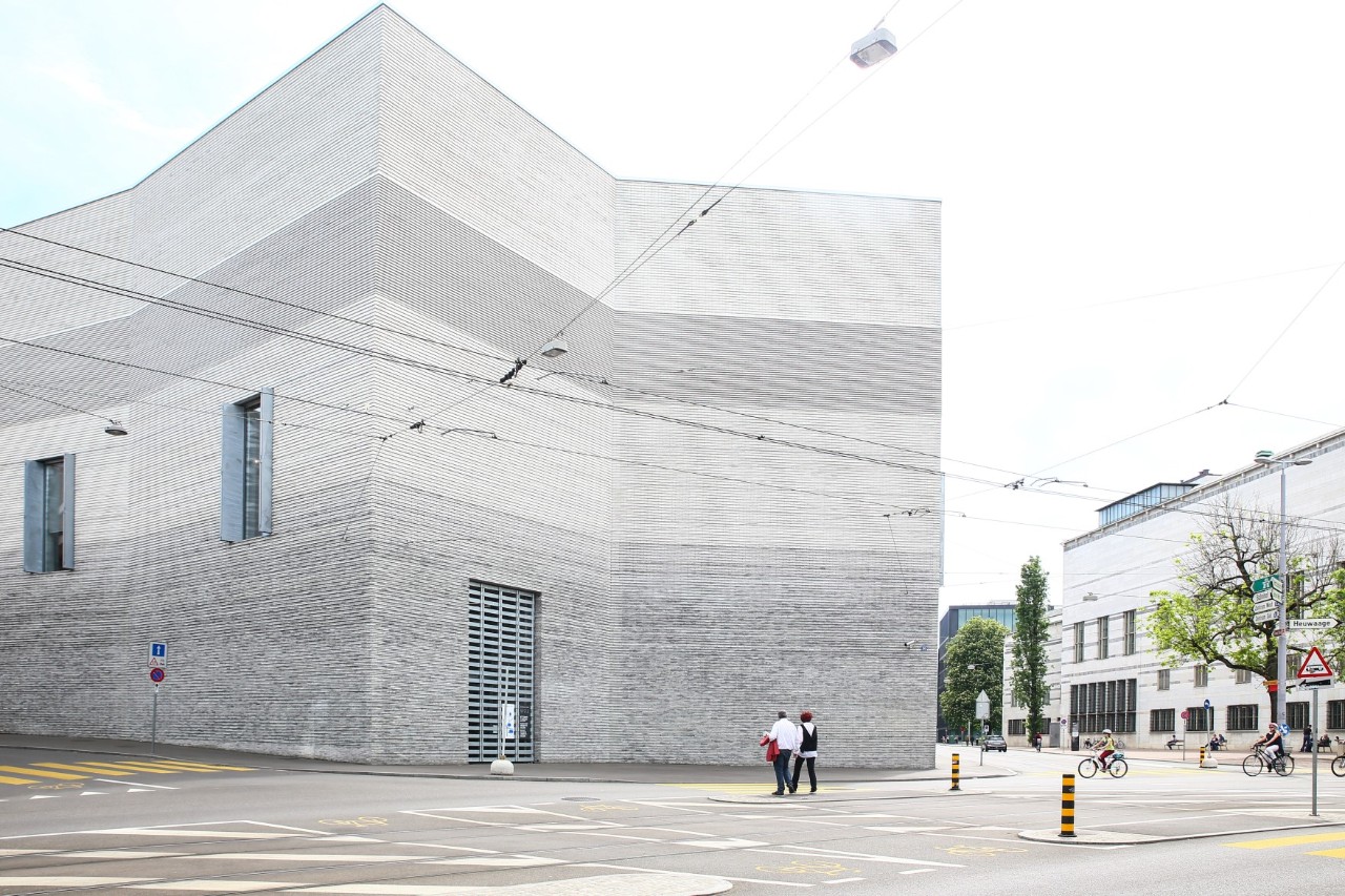 Part of the Kunstmuseum’s main building with Picasso poster and trees 