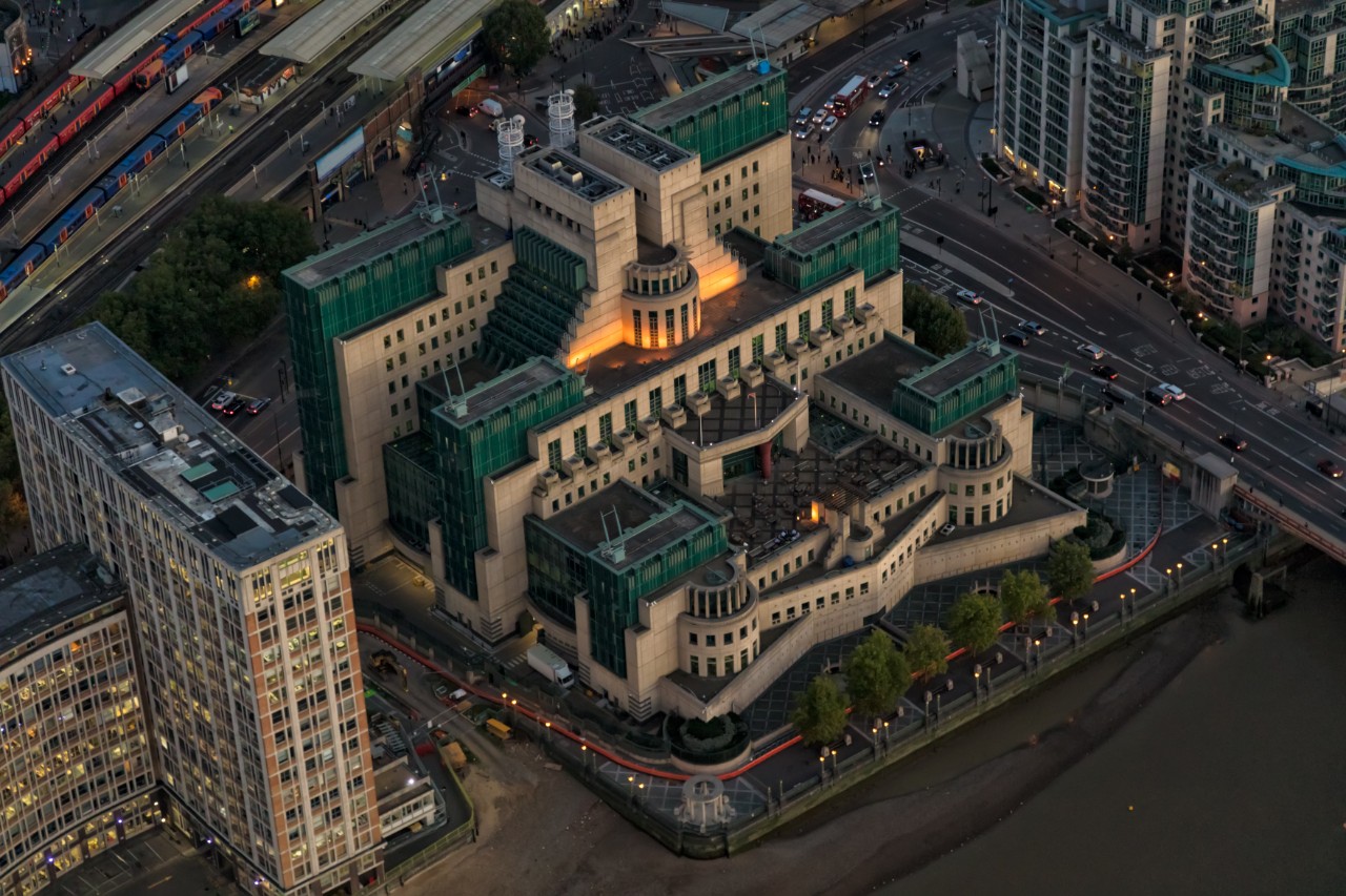 Aerial view of the MI6 building with surrounding urban area.