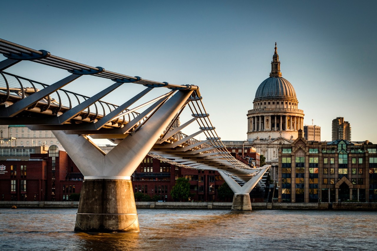 Millennium Bridge in London with modern steel structure.