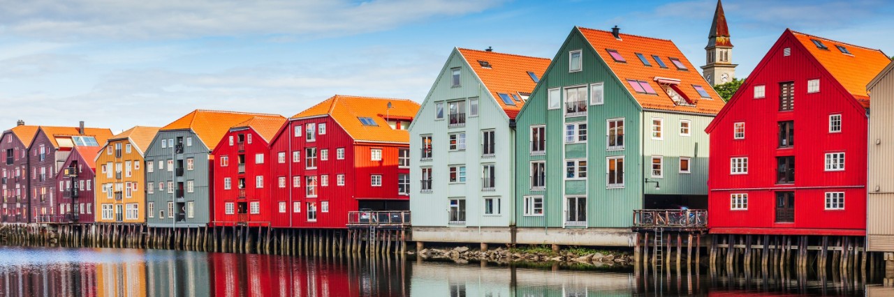 Colourful wooden buildings by the River Nidelva in the old city district of Trondheim. © SCStock/stock.adobe.com  