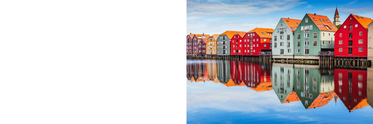 Colourful wooden buildings by the River Nidelva in the old city district of Trondheim. © SCStock/stock.adobe.com  