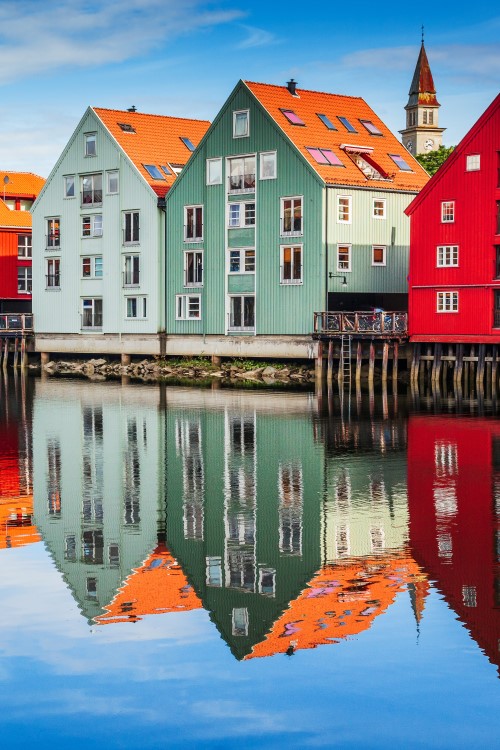 Colourful wooden buildings by the River Nidelva in the old city district of Trondheim. © SCStock/stock.adobe.com  