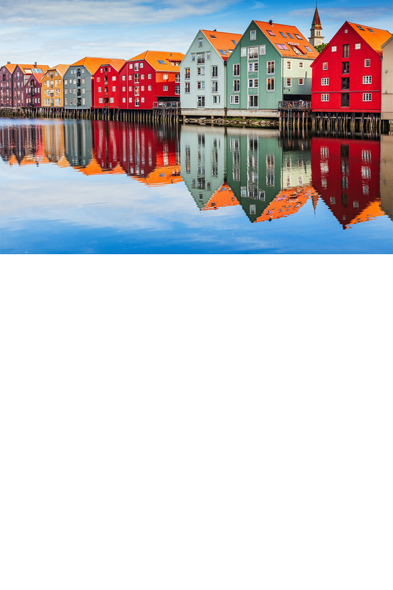 Colourful wooden buildings by the River Nidelva in the old city district of Trondheim. © SCStock/stock.adobe.com  