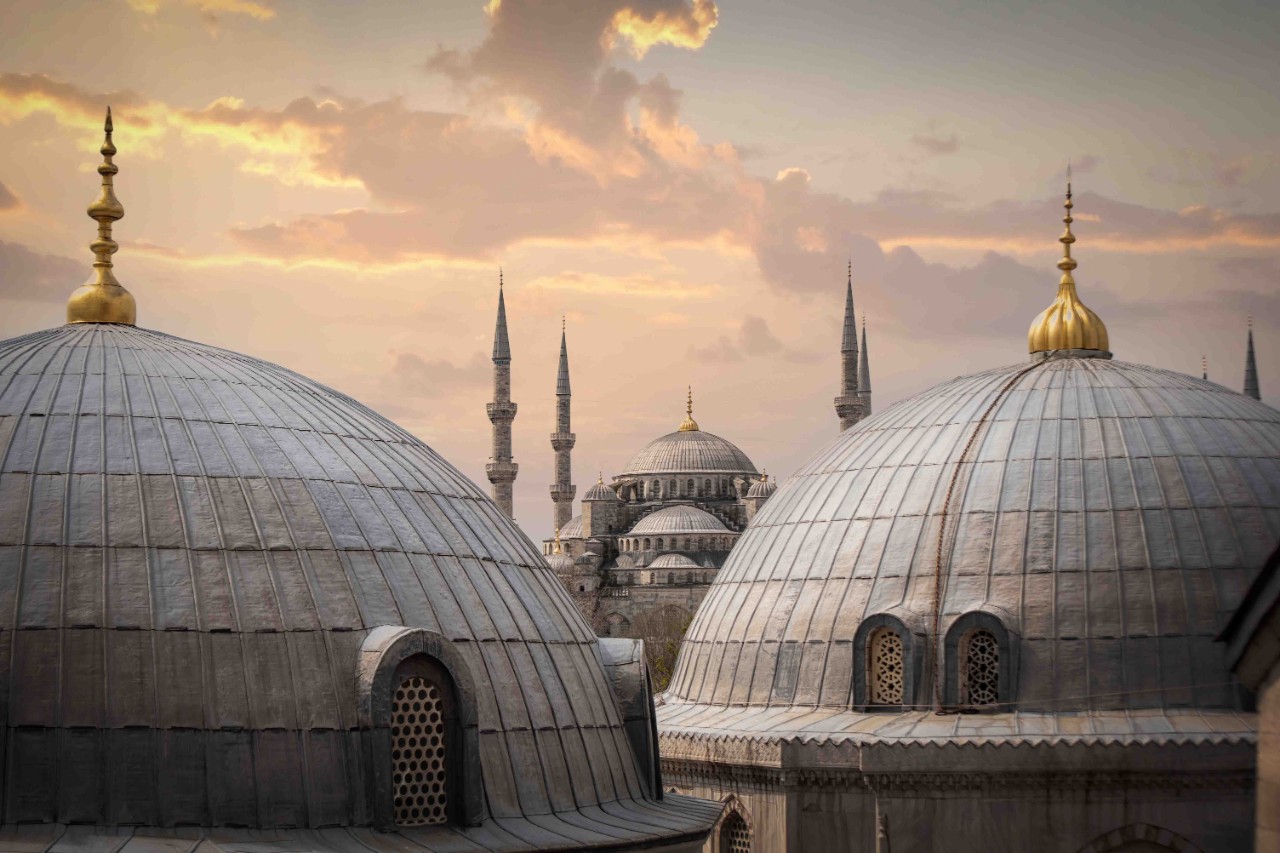The domes of the Blue Mosque with intricate ornaments.