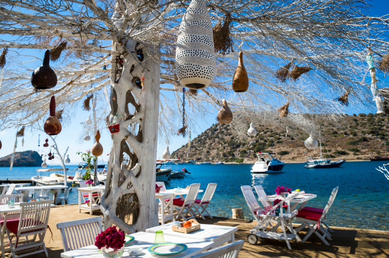Open-air restaurant by the sea.