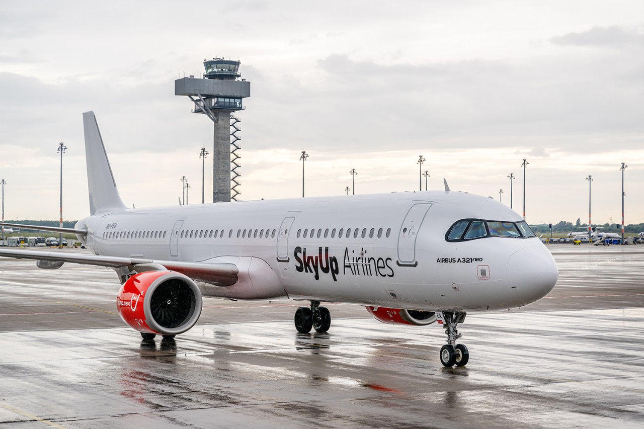 An aircraft of the airline SkyUp on the apron