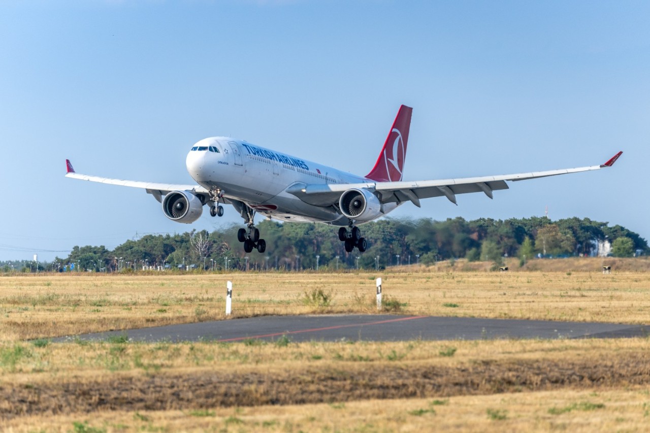 A Turkish Airlines aircraft is taking off from BER.