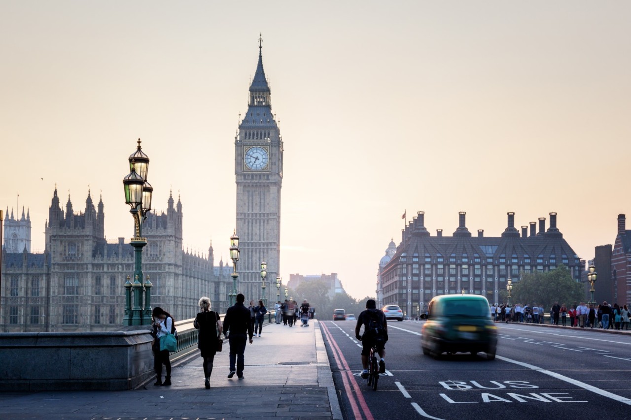 Big Ben by day, clock tower with architectural details.