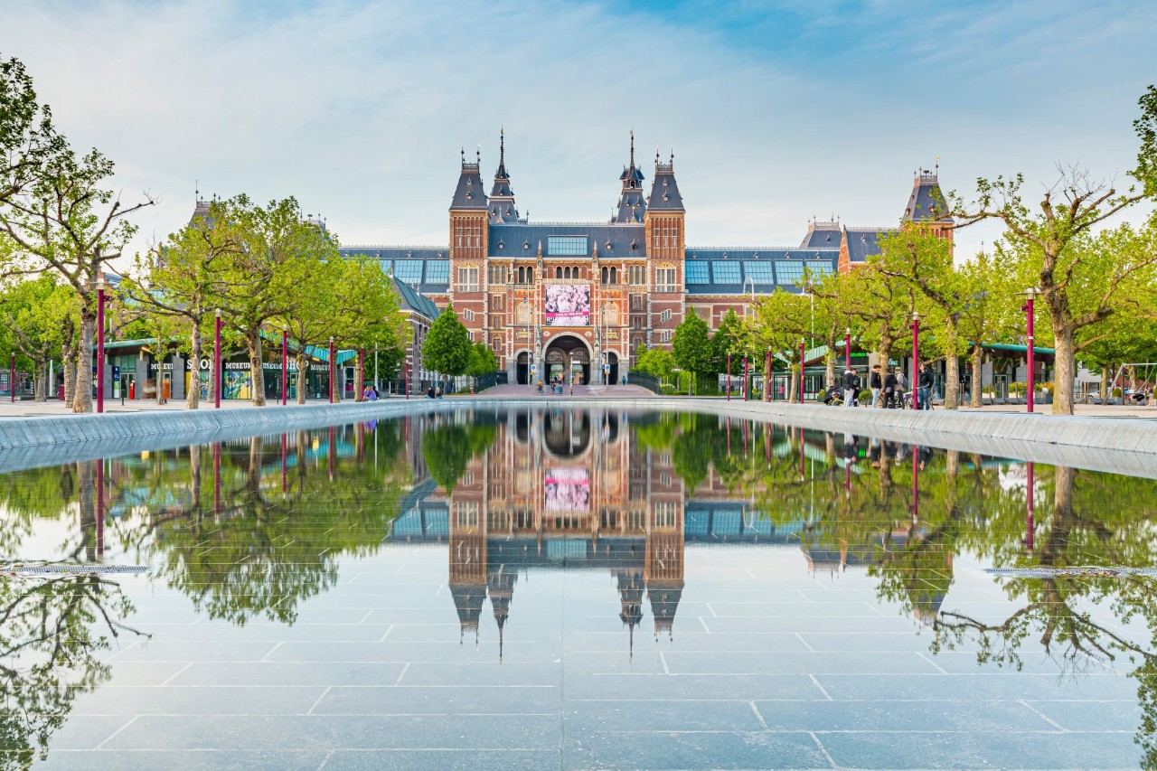 Museumplein featuring the domes of the Rijksmuseum.