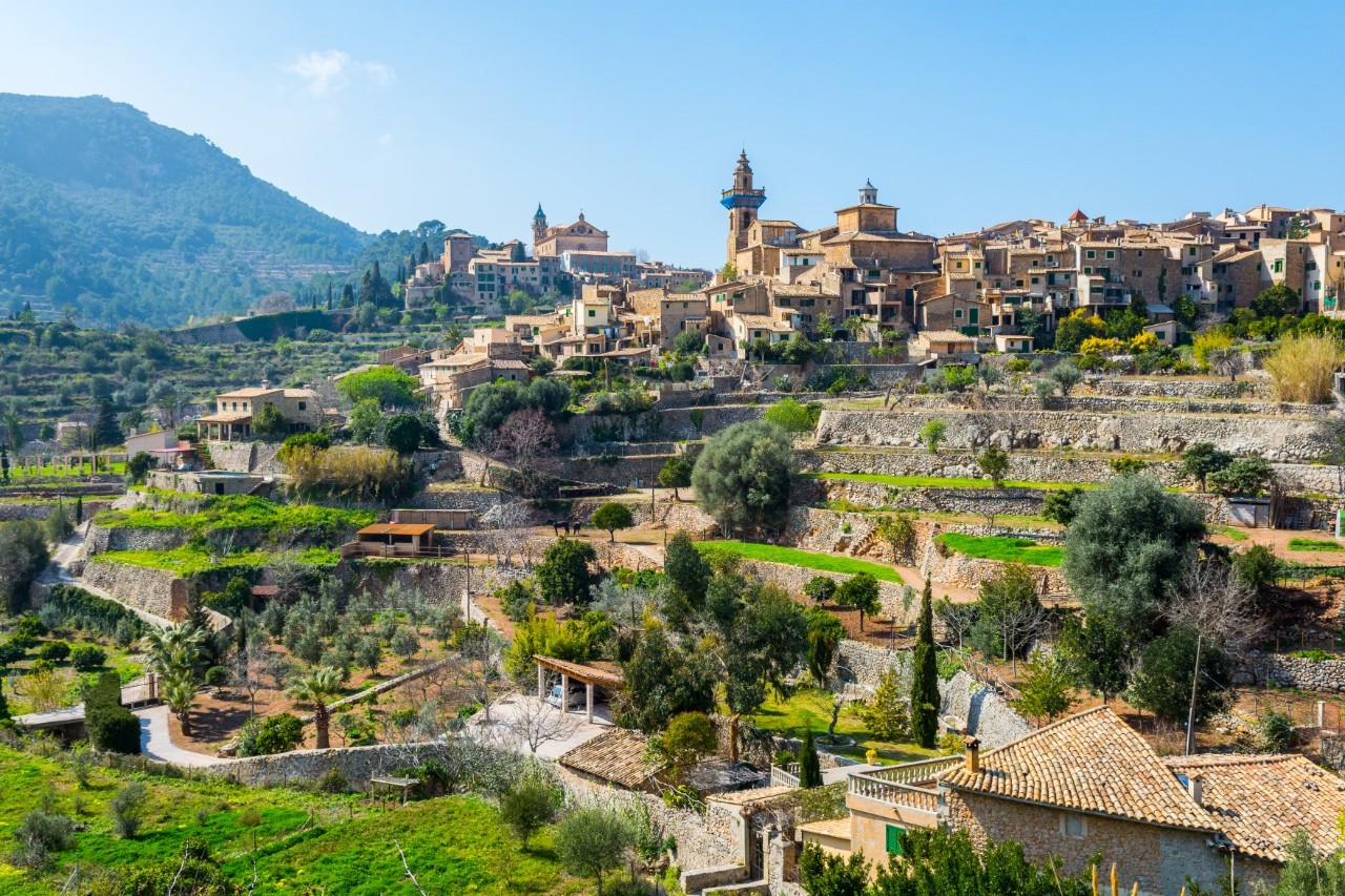 The mountain village of Valldemossa enclosed in a picturesque mountain landscape 