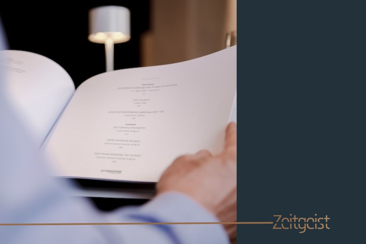 Guest reads the VIP Service menu. He holds the menu in his hand.