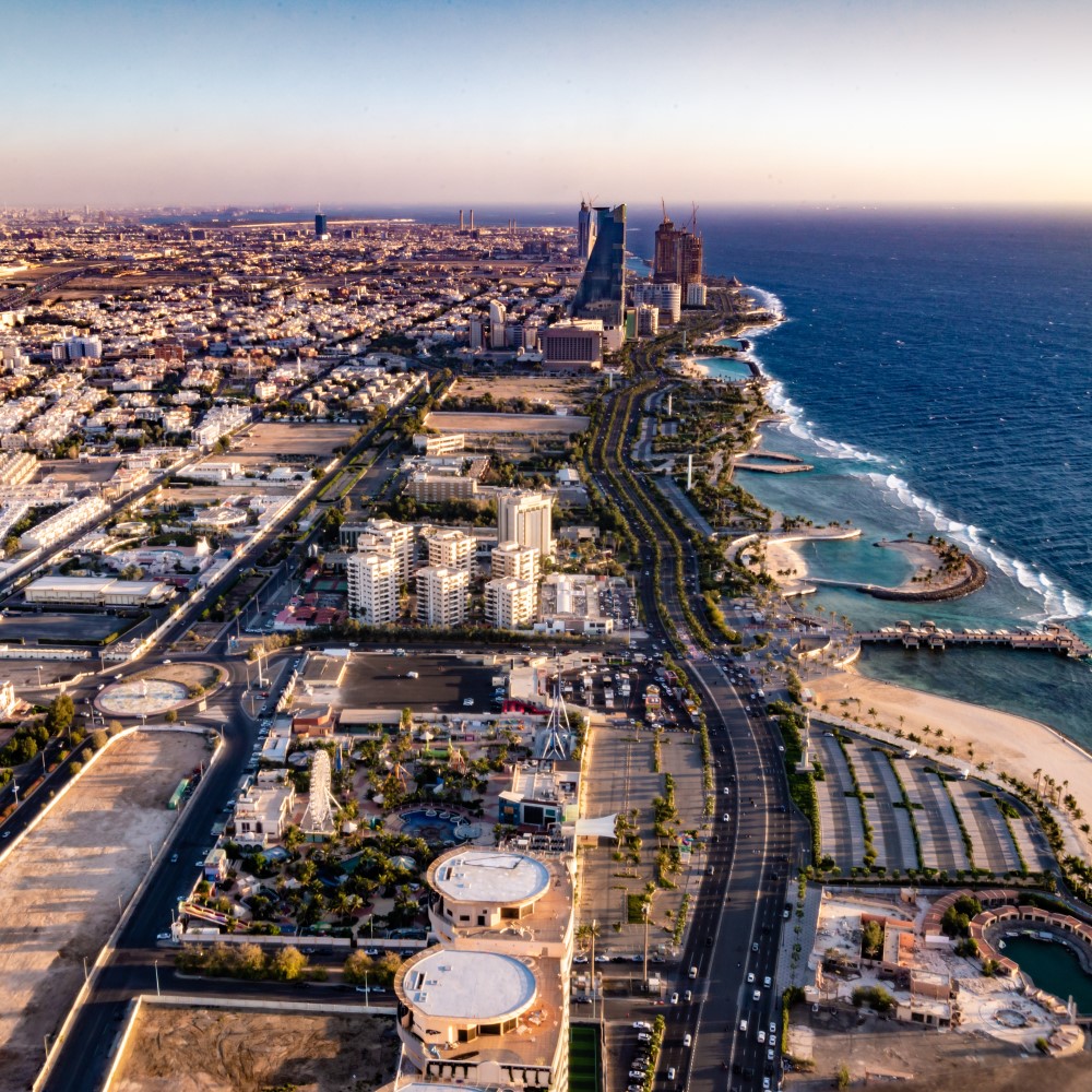 Aerial view of Jeddah. You can see houses,. streets and the sea.