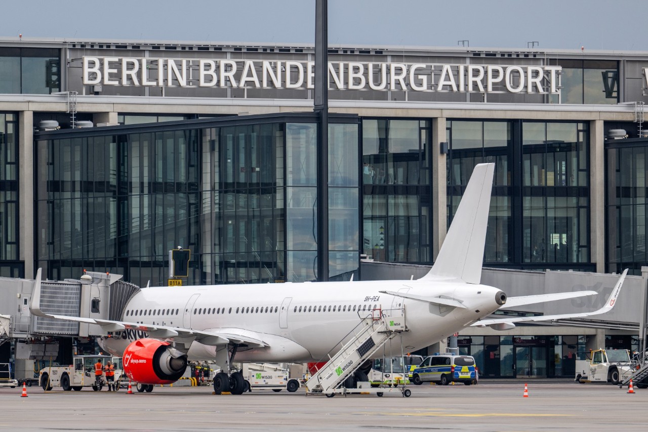 An aircraft belonging to SkyUp airline at the gate