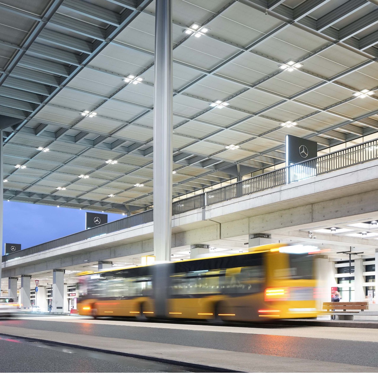 Buses and cars in front of Terminal 1