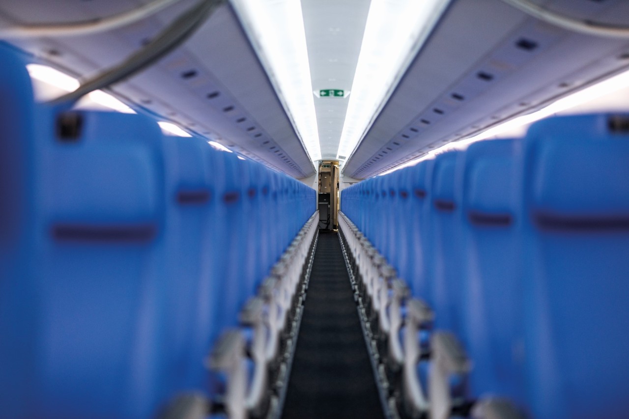 The interior of an aircraft cabin