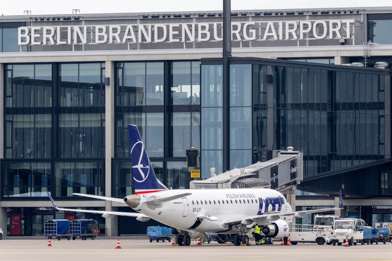 A LOT Polish Airlines plane on the apron at BER Airport