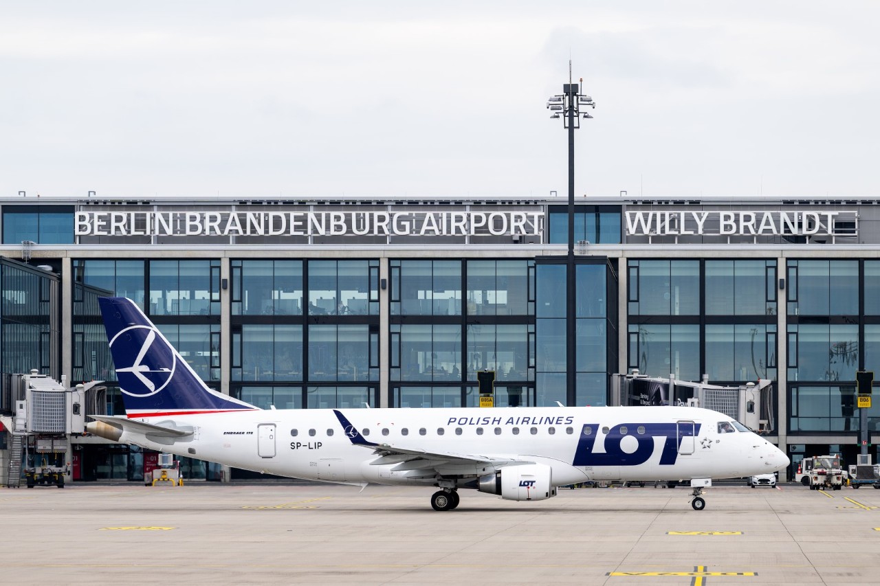 A LOT Polish Airlines plane on the apron at BER Airport