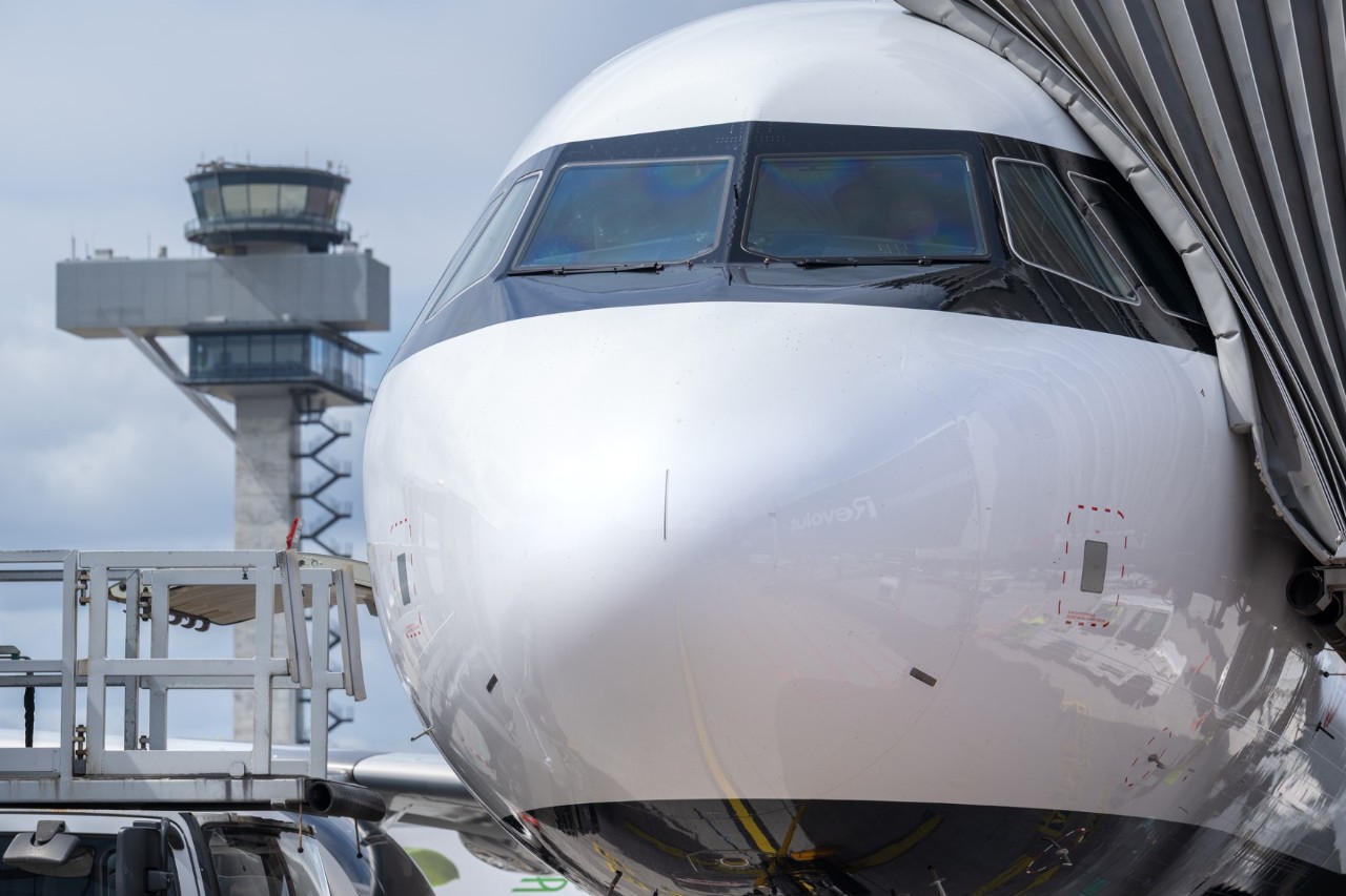 A close-up of the cockpit, with the control tower behind it.