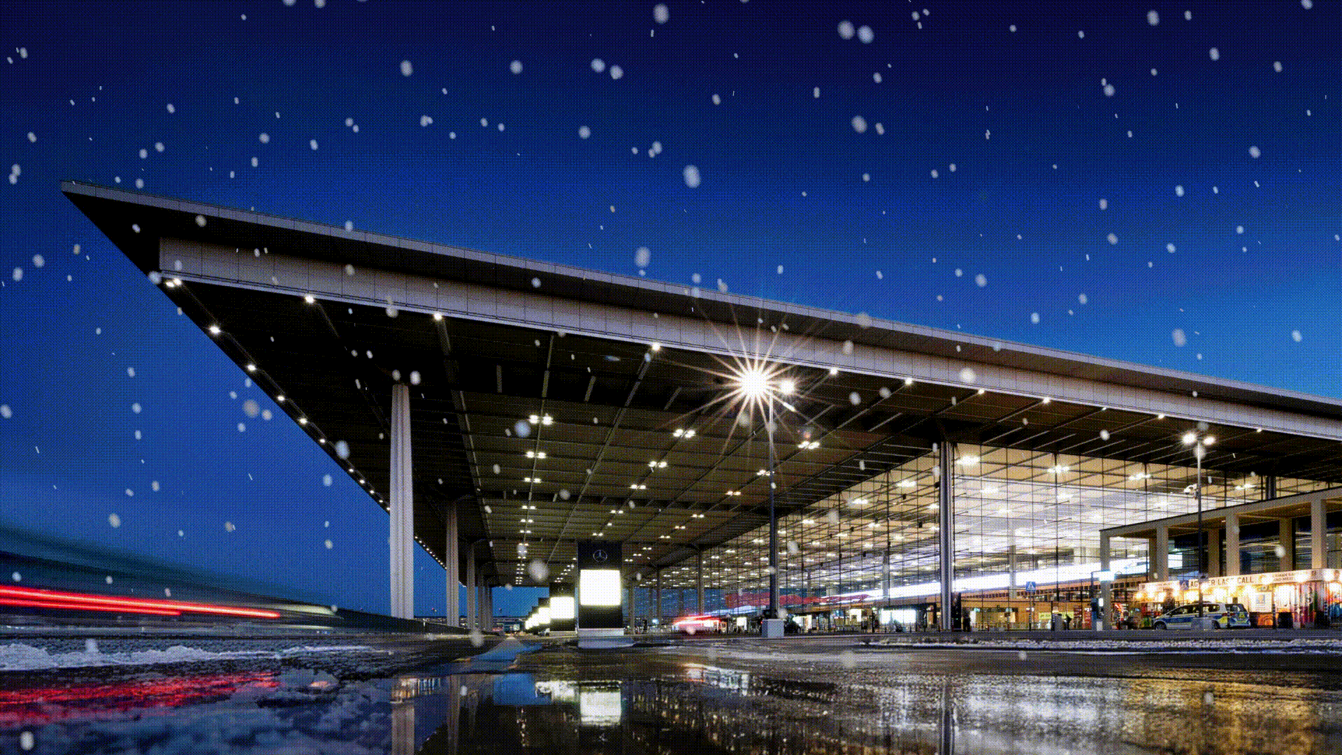 Terminal 1 at BER in winter with snowfall. 