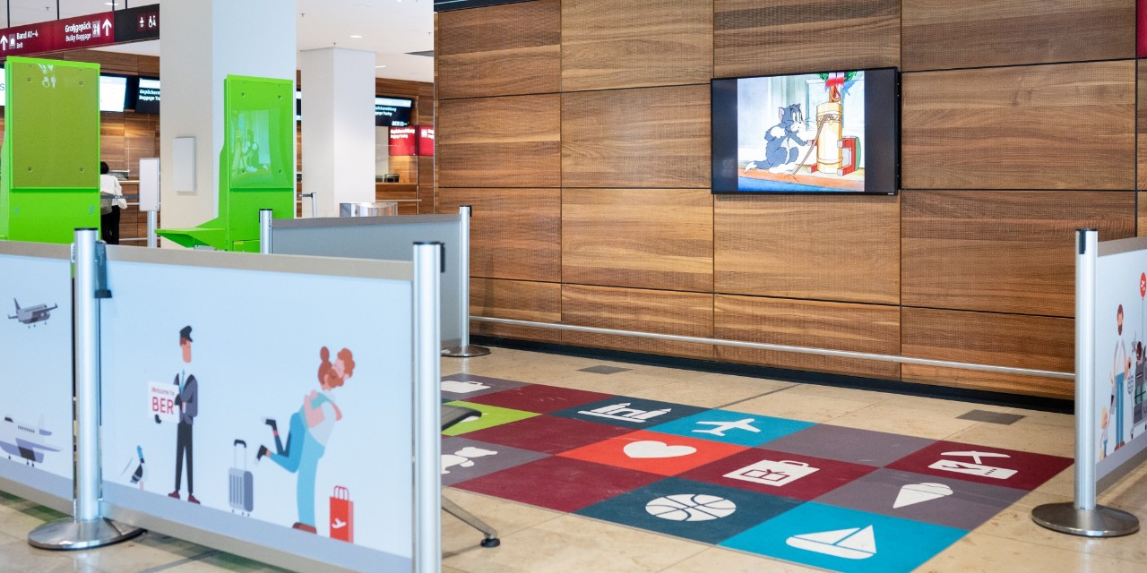 Kids' corner with TV and play mat