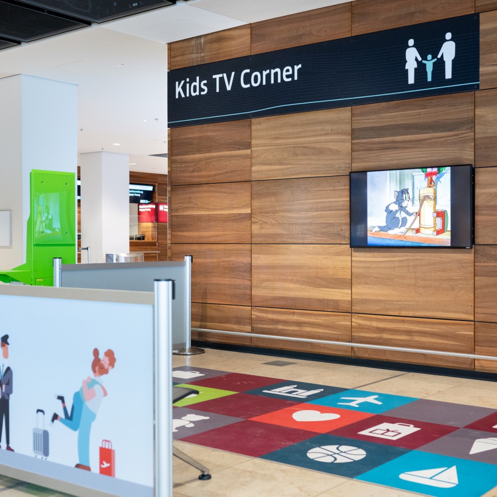 Kids' corner with TV and play mat