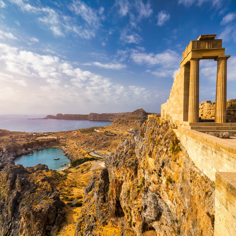 An acropolis on a high rock above the sea